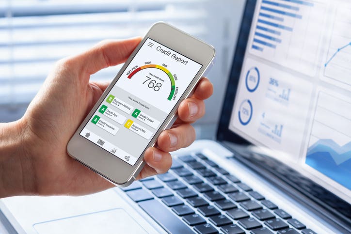 Credit Report with Score rating app on smartphone screen showing creditworthiness of a person for loan and mortgage application based on payment history and debt usage, budget management performance